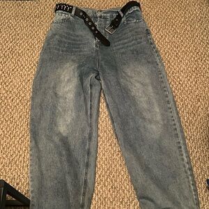 Blue baggy jeans with bullet belt